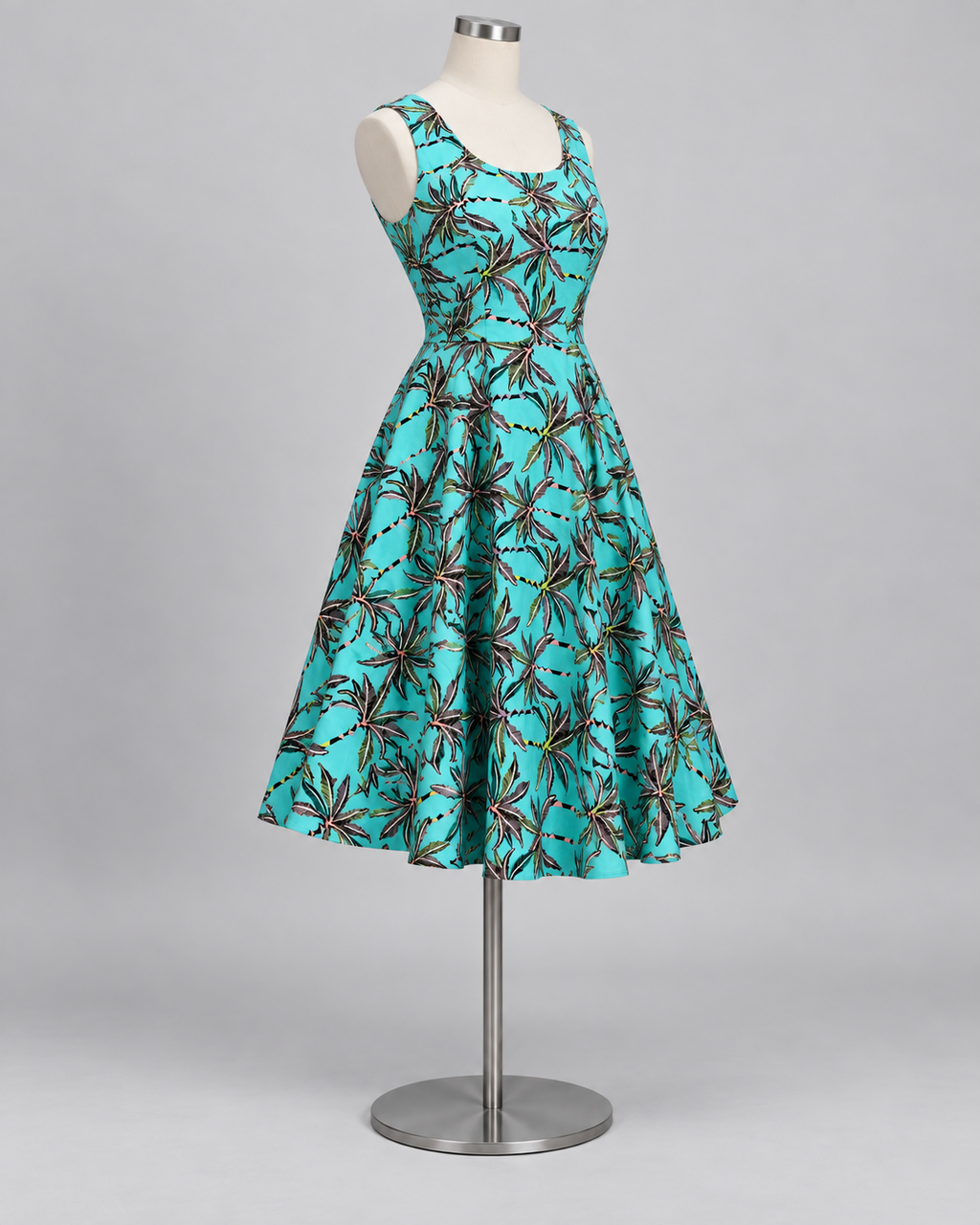Stitched style reference - turquoise tropical palm print linen frock three-quarter view